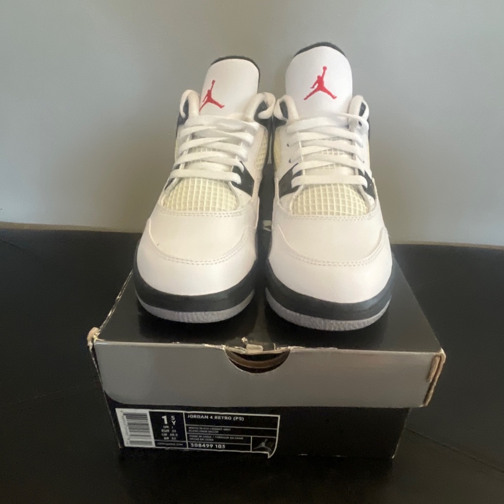 Brand new Nike Jordan 4 Retro PS . Size 1.5Y. White/Black-Cement Grey 308499 103